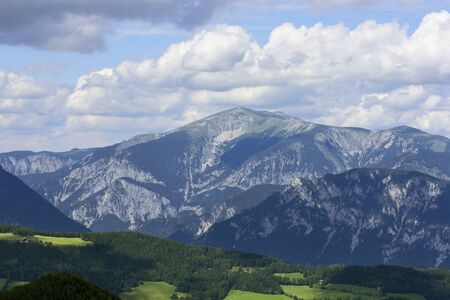 Alpen mountains at sunny day view from Semmering Hirschenkogel to Schneeberg Austriaの写真素材