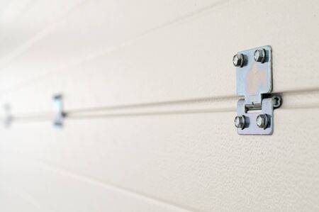 White garage door panels from inside with connectionsの写真素材