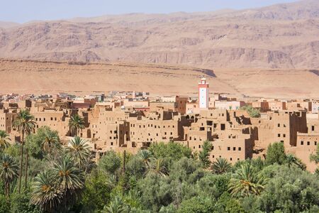 Valley view with mountains, villages and palm trees near Thinghir in Morocco, Africaの写真素材