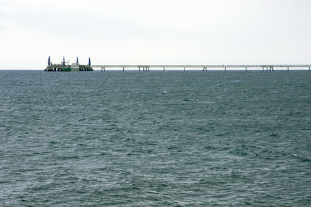 Long industrial bridge with pier at Cyprusの写真素材
