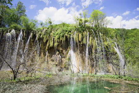 Waterfalls in Plitvice Lakes National Park at sunriseの写真素材