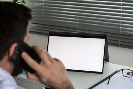 Doctor using tablet telemedicine telehealth conceptの写真素材