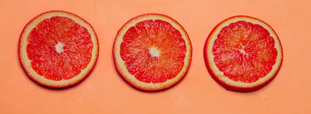 Different Citrus Fruit On Gray Concrete Tableの写真素材