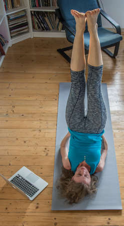 Woman doing yoga at home