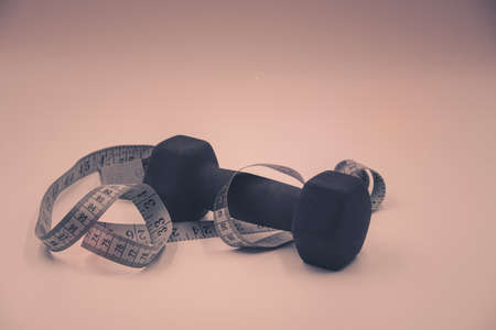 Sports flat lay on an white background.  Online training. Schedule of sports exercises.の写真素材