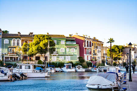 "Port Sa Playa, Valencia, Spain - 12/08/2021: Bright sunny day panoramic photo looking at Port Saplaya, Valencia's Little Venice"のeditorial素材