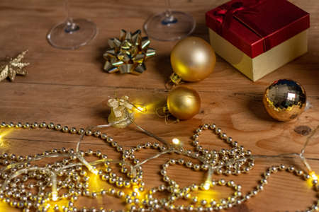 Christmas background with gift boxes, clews of rope, paper's rools and decorations for holidays.Copy...