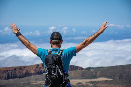 man hiking in El Teide national park Tenerife. hiking in the mountains