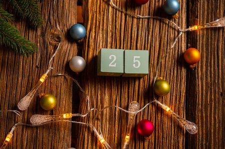 Wooden calendar set on the 25th of December. Christmas concept