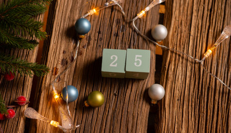 Wooden calendar set on the 25th of December. Christmas concept