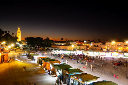 Marrakech, Morocco - December 5 2025: People gather in the Jemaa el-Fnaa square in the Moroccan city...