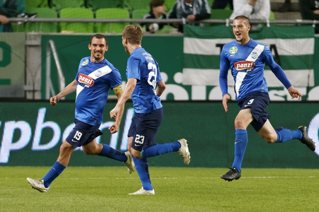 BUDAPEST, HUNGARY - APRIL 16, 2016: Jozsef Kanta (l) celebrates his goal with Daniel Vadnai and Darko Nikac (r) of MTK Budapest during Ferencvaros - MTK Budapest OTP Bank League football match at Groupama Arena.のeditorial素材
