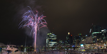 16 July 2016: Darling Harbour, Sydney, AUSTRALIA: fireworks display marking the end of the Cool Yule Festival, a Southern Hemisphere winter festivalのeditorial素材