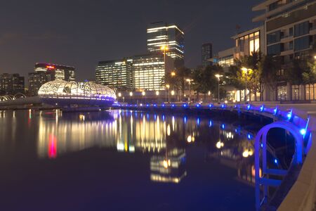 4 August 2016: Winter evening view of Webb Bridge in Melbourne's Docklands. Used for walking and cycling, Webb bridge was developed in collaboration with artist Robert Owenのeditorial素材