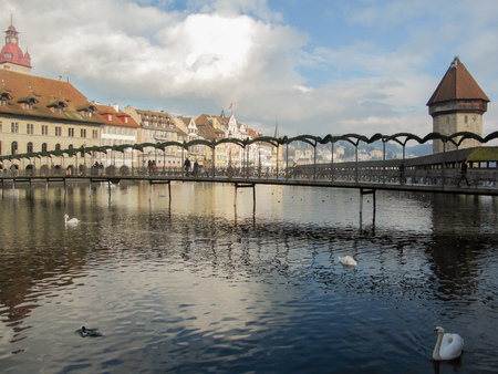 21 December 2012: Lucerne / Luzern, Switzerland. Footbridge crossing the Reuss river in the middle of the cityのeditorial素材