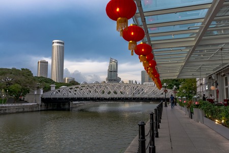 16 January 2017: Chinese new year red lanterns hanging against the blue sky in Downtown Singapore - riverbankのeditorial素材