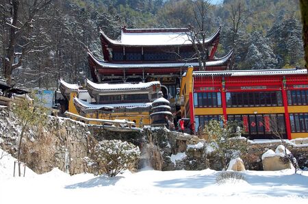 Jiuhua Mountain Snow with temple viewの写真素材