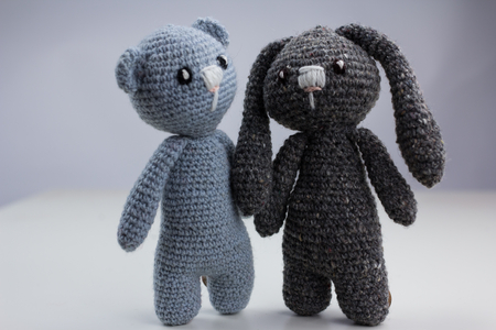two yarn toys