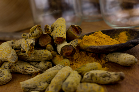 root and grinded tumericの写真素材