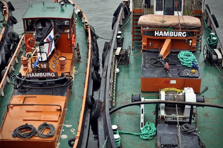 May 2015, St. Pauli, Hamburg. Frontal view of fishing boats docked at Hamburg's Sankt Pauli harbourのeditorial素材
