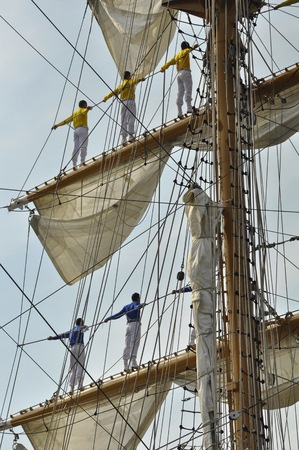 Ij river, Amsterdam, the Netherlands - August 23, 2015: Back view of the sailors of the ARC Gloria...