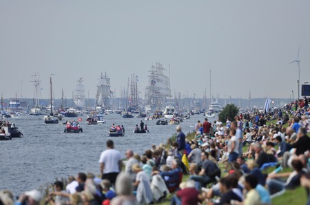 Ij River, Amsterdam, the Netherlands - August 19, 2015: Spectators of looking at the tall ships approaching the port of Amsterdam, at the time of the SAIL 2015 www.sail.nl, an international public nautical event held once in every 5 years since 1975.のeditorial素材