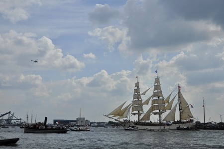 Ij River, Amsterdam, the Netherlands - August 19, 2015: Distant view of the Europa tall ship Holland on the Ij river, approaching the port of Amsterdam on the first day of the SAIL www.sail.nl, an international nautical event held every 5 years since 1975のeditorial素材