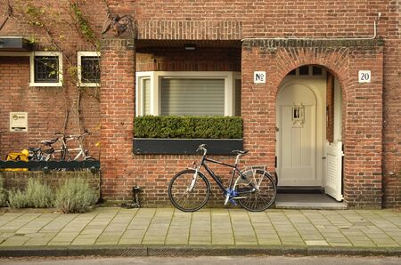 Amsterdam, Netherlands - 25 October, 2015: Red brick residential entrance on the J.J. Viottastraatのeditorial素材