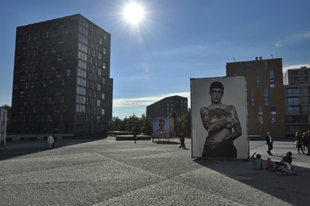 Breda, Netherlands - October 16, 2016: The Chass park with visitors during the Bredaphoto 2016 event, with Ralf Mitsch's photography in the foreground, under the clear skyのeditorial素材