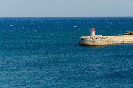 Valletta,MALTA -CIRCA OCTOBER, 2015- lighthouse in Grand Harbour, Valletta, Maltaのeditorial素材