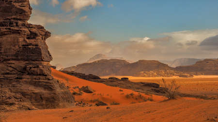 Wadi Rum, Jordan. Desert sand dunes and the mountains. Middle East typical landscape.