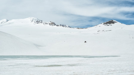 Winter mountain landscape. A frozen lake and snow-capped peaks. Lake Kari. Armenia.の写真素材