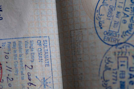 UAE and Oman stamps in the passport.のeditorial素材