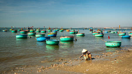 People working in Mui Ne Fishing Village, Vietnam, December 11, 2019.のeditorial素材