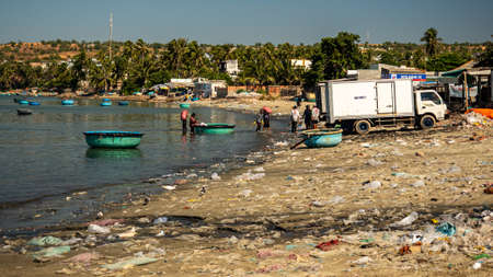 People working in Mui Ne Fishing Village, Vietnam, December 11, 2019.