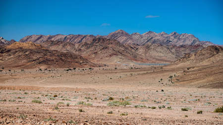 Mountains between the city of Aqaba and the Wadi Rum Protected Area near the Jordan-Saudi border. Tutun, Jordan.の写真素材