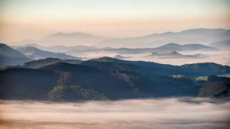The Ceahlau Massif seen from the Rarau Mountains, Eastern Carpathians, Romania.