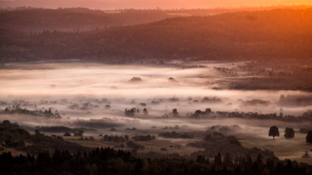 Sunrise in the San River valley on the border between Poland and Ukraine. Bieszczady Mountains,...