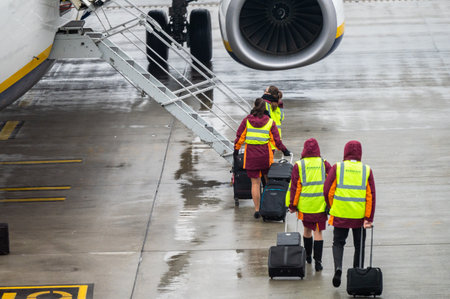 Krakow, Poland - November 18, 2022: Ryanair stewardesses waiting for boarding at the International John Paul II Krakow-Balice Airport.のeditorial素材