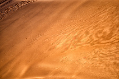 Desert sand dunes close-up background. Sahara Desert, Erg Chebbi, Morocco.の写真素材