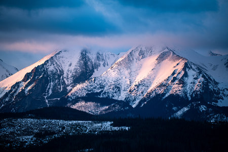 Sunrise over the Tatra Mountains from the village of Åapszanka.の写真素材