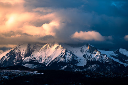Sunrise over the Tatra Mountains from the village of Åapszanka.の写真素材