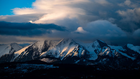 Sunrise over the Tatra Mountains from the village of Åapszanka.の写真素材