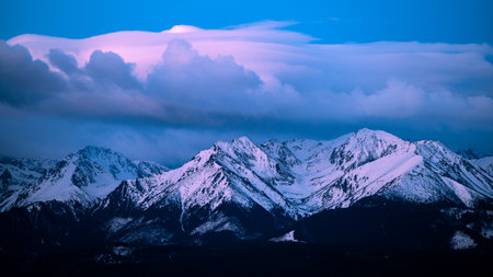 Sunrise over the Tatra Mountains from the village of Åapszanka.の写真素材