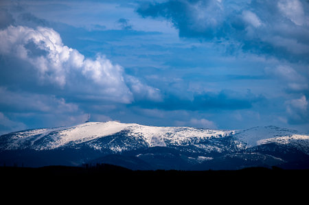 Cloudy winter landscape of the Low Tatra Mountains, Slovakia. Mount Kralova hola.の写真素材