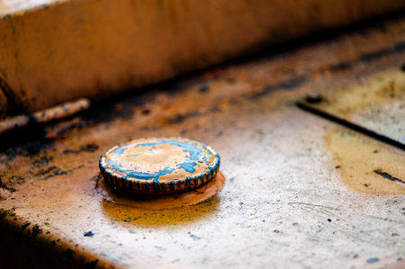 Authentic old style industrial background. Close-up of a dirty part of an old road roller. Orange...
