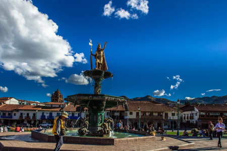 Fountain of the Inca Pachacutec with the cathedral in background on the Plaza de Armas of Cusco, Peru.のeditorial素材