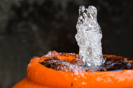 Jar fountain in the gardenの写真素材