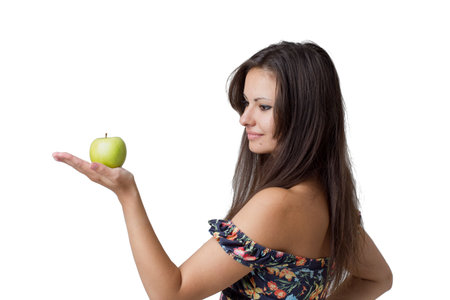 Beautiful girl with apple  Isolated on white background の写真素材
