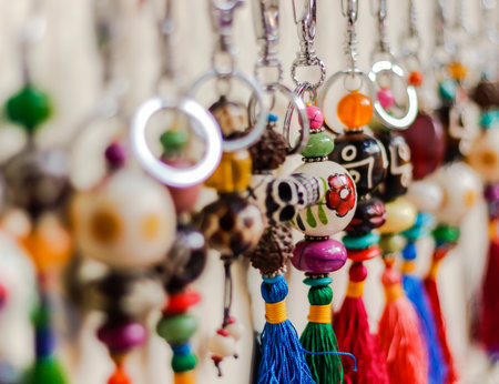 keyring are hanging on the display of shopの写真素材